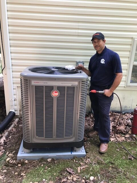 Man installing ac unit